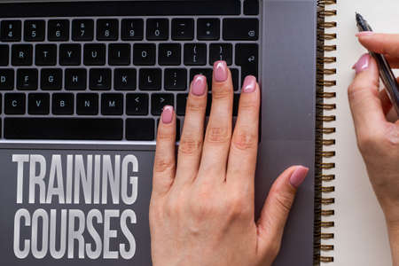 Handwriting text Training Courses. Concept meaning lessons to teach the skills and knowledge for a job Hands Pointing Pressing Computer Keyboard Keys Typewriting New Ideas.の写真素材