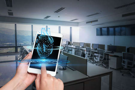 Hand Touching Screen Of Mobile Phone Inside Office Showing Futuristic Technology. Finger Tapping...