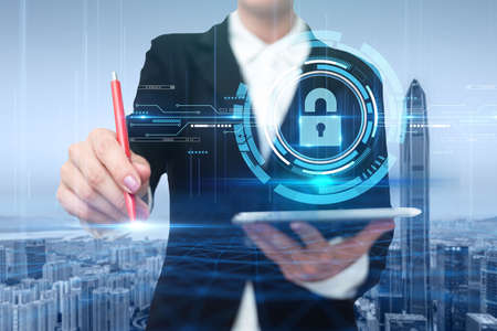 Woman In A Suit Virtually Writing On Screen Holding Tablet Showing Futuristic Technology....