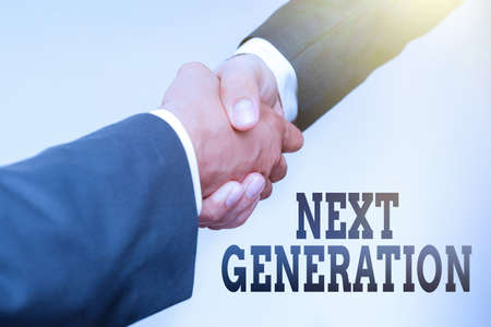 Inspiration showing sign Next Generation. Concept meaning product that has been developed using the latest technology Two Professional Well-Dressed Corporate Businessmen Handshake Indoorsの写真素材