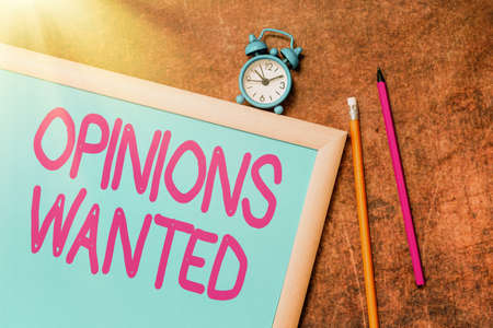 Hand writing sign Opinions Wanted. Internet Concept judgment or advice by an expert wanted a second...