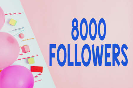 Writing displaying text 8000 Followers. Business idea number of individuals who followsの写真素材