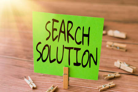 Text sign showing Search Solution. Business showcase an action or process of finding solution to a problem Blank Square Note Surrounded By Laundry Clips Showing New Meaning.の写真素材