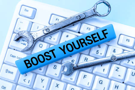 Text showing inspiration Boost Yourself. Word for to make yourelf feel more positive or more...