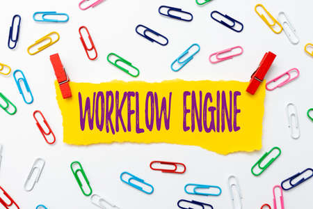 Writing displaying text Workflow Engine. Word Written on software application that manages business...