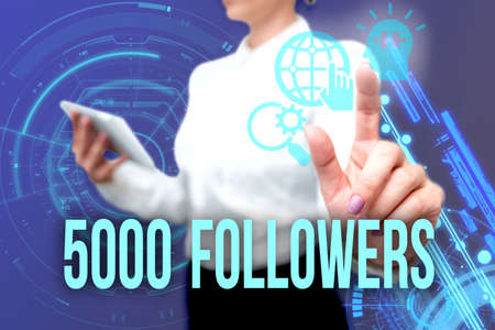 Writing displaying text 5000 Followers. Word Written on number of individuals who follows someone in  Lady In Uniform Standing Hold Phone Virtual Press Button Futuristic Tech.の写真素材