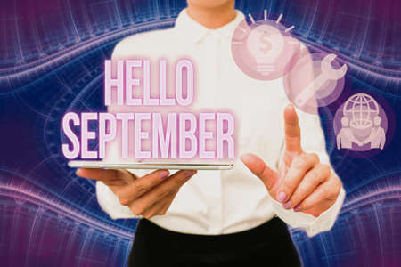 Text caption presenting Hello September. Business overview Eagerly wanting a warm welcome to the month of September Lady In Uniform Holding Phone Virtual Press Button Futuristic Technology.の写真素材