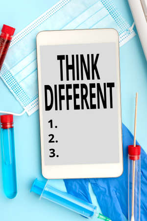 Handwriting text Think Different. Business overview be unique with your thoughts or attitude Wind of change Typing Medical Notes Scientific Studies And Treatment Plansの写真素材