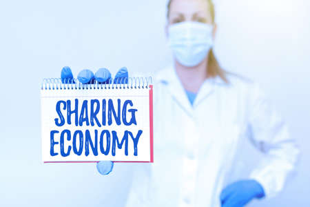 Writing displaying text Sharing Economy. Business overview economic model based on providing access to goods Demonstrating Medical Ideas Presenting New Scientific Discoveryの写真素材