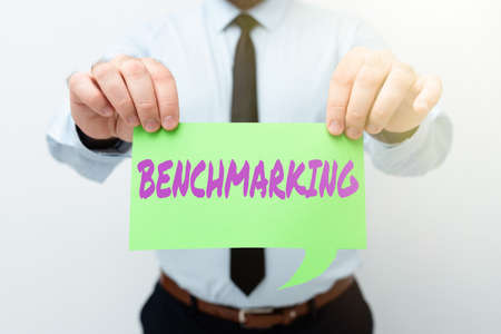 Text caption presenting Benchmarking. Business idea evaluate something by comparison with standard or scores Presenting New Plans And Ideas Demonstrating Planning Processの写真素材