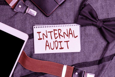 Handwriting text Internal Audit. Business showcase Evaluates the effectiveness of the controls and processes Smartphone Voice And Video Calls, Displaying Pocket Contentsの写真素材