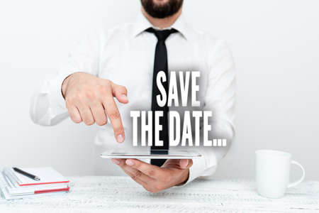 Hand writing sign Save The Date. Business idea remember specific important days or time using calendar Presenting Communication Technology Smartphone Voice And Video Callingの写真素材