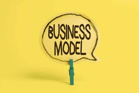 Hand writing sign Business Model. Word for Identifying revenue sources Plan on how to make profit Colorful Idea Presentation Displaying Fresh Thoughts Sending Messageの写真素材