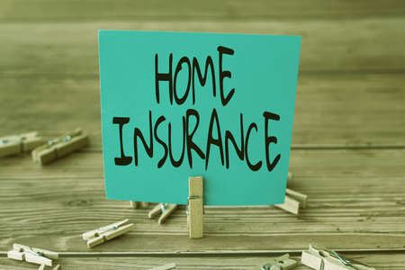 Conceptual display Home Insurance. Business concept Covers looses and damages and on accidents in the house Blank Square Note Surrounded By Laundry Clips Showing New Meaning.の写真素材