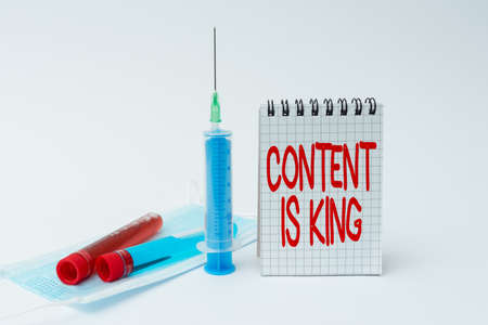 Writing displaying text Content Is King. Business concept marketing focused growing visibility non paid search results Writing Important Medical Notes Laboratory Testing Of New Infectionsの写真素材