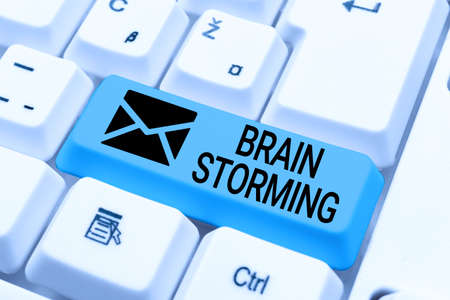 Hand writing sign Brain Storming. Business idea Stimulating creative thinking Developing new ideas...