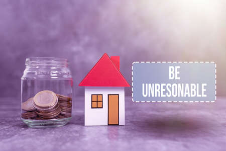 Sign displaying Be Unreasonable. Business approach Behaving not in accordance with practical realities Creating Property Contract To Sell, Presenting House Sale Dealの写真素材