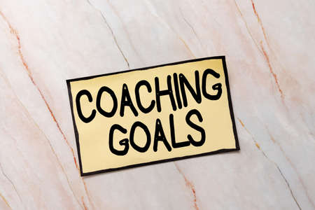 Text caption presenting Coaching Goals. Business approach Empowers individuals Encourages them to take responsibility New Ideas Fresh Concept Creative Communications Productive Mindsetの写真素材