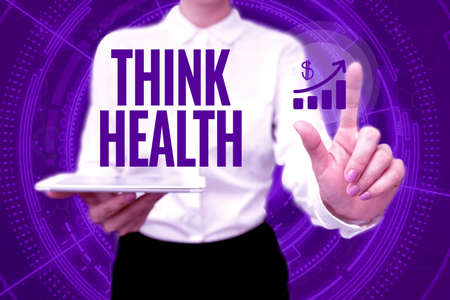 Hand writing sign Think Health. Internet Concept state of complete physical mental and social well being Lady In Uniform Holding Phone Virtual Press Button Futuristic Technology.の写真素材
