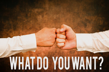 Handwriting text What Do You Want Question. Internet Concept say or write in order to ask person about something Two Professional Well-Dressed Corporate Businessmen Handshake Indoorsの写真素材
