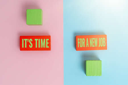 Writing displaying text It S Time For A New Job. Concept meaning having paid position regular employment Two Objects Arranged Facing Inward Outward On a Separated Coloured Backgroundの写真素材