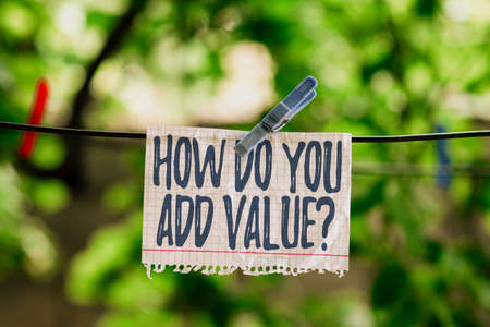 Hand writing sign How Do You Add Value Question. Business overview improve work undertaking production process Thinking New Bright Ideas Renewing Creativity And Inspirationの写真素材
