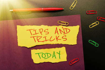 Hand writing sign Tips And Tricks. Conceptual photo means piece advice maybe suggestion how improve Thinking New Bright Ideas Renewing Creativity And Inspirationの写真素材