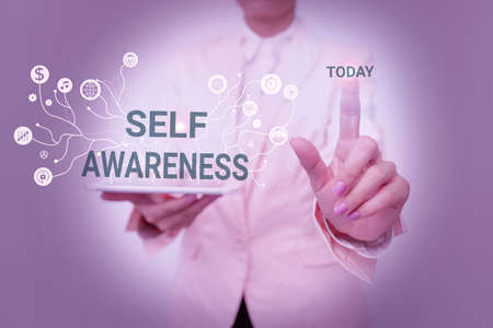 Writing displaying text Self Awareness. Conceptual photo Consciousness of a person towards a situation or happenings Lady In Uniform Standing And Holding Tablet Showing Futuristic Technology.の写真素材