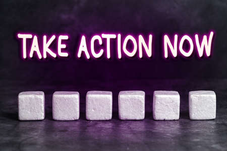 Conceptual caption Take Action Now. Business approach do something official or concerted achieve aim with problem Stack of Sample Cube Rectangular Boxes On Surface Polished With Multi-Colourの写真素材