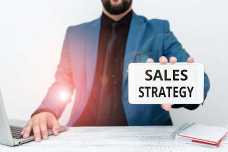 Conceptual caption Sales Strategy. Conceptual photo Plan for reaching and selling to your target market Marketing Tech Guru Selling Newly Developed Device, Teacher Confiscating The Phoneの写真素材
