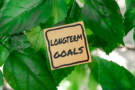 Sign displaying Longterm Goals. Concept meaning Strategic target that is required more time for completion Thinking New Bright Ideas Renewing Creativity And Inspirationの写真素材