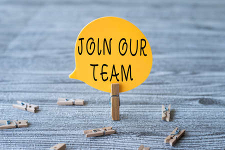 Inspiration showing sign Join Our Team. Word for invite someone to work together for particular purpose target Piece Of Blank Speech Bubble Surrounded By Laundry Clips Showing New Idea.の写真素材