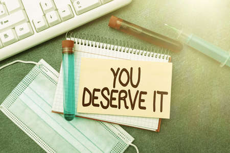 Text caption presenting You Deserve It. Internet Concept should have it because of their qualities or actions Typing Medical Notes Scientific Studies And Treatment Plansの写真素材