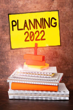 Text caption presenting Planning 2022. Business overview process of making plans for something next year Organized And Neat Sorting Arrangement Files And Document Storing Ideasの写真素材