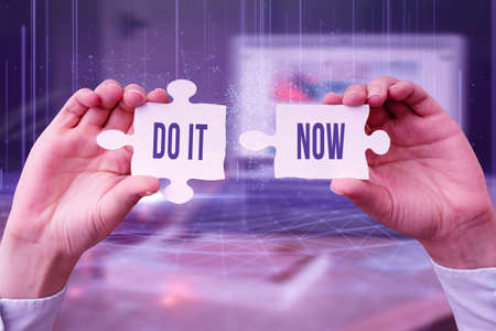 Sign displaying Do It Now. Business approach not hesitate and start working or doing stuff right away Business Woman Holding Jigsaw Puzzle Piece Unlocking New Futuristic Tech.の写真素材