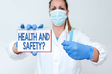 Conceptual caption Health And Safety Question. Concept meaning regulations and procedures to prevent accident or injury Testing New Vaccine For The Virus Presenting Vaccination Clinical Trialsの写真素材