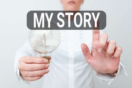 Text sign showing My Story. Business concept your past life events actions or choices you made Lady outfit touching screen with lamp in hand presenting technology ideasの写真素材