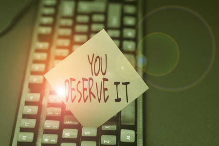 Hand writing sign You Deserve It. Concept meaning should have it because of their qualities or actions Abstract Typing A Good Restaurant Review, Ordering Food Online Conceptの写真素材