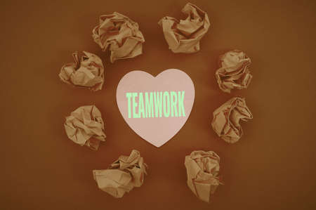 Handwriting text Teamwork. Business approach combined action of group especially when effective and...