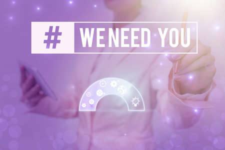 Handwriting text We Need You. Business approach asking someone to work together for certain job or target Lady In Uniform Holding Pen Phone Showing Futuristic Virtual Interface.の写真素材