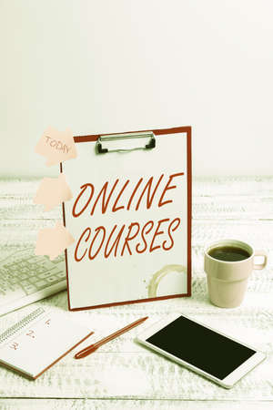 Text caption presenting Online Courses. Word Written on Revolutionizing formal education Learning through internet Typing New Ideas Business Planning Idea Voice And Video Callsの写真素材