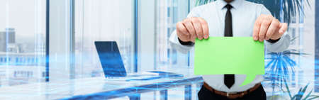 Man Wearing Black Tie Holding Empty Page Chat Box Around Futuristic Technology. Employee Presenting...