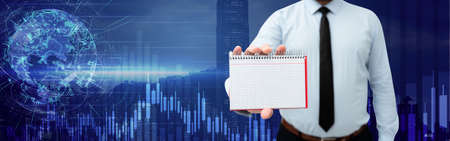 Picture Of Businessman Holding Empty Page Graphing Notebook Around Futuristic Technology. Employee...