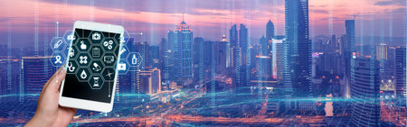 Buildings Behind Picture Of Hand Holding Tablet Showing Wonderful Futuristic Technology. Construction Backside Palm Using Padpresenting Modern Automationの写真素材
