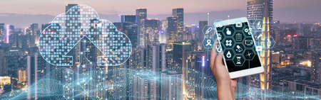 Buildings Behind Picture Of Hand Holding Cellular Phone Showing Futuristic Technology. Construction...