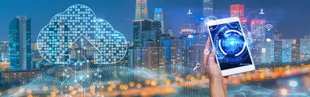 Buildings Behind Picture Of Hand Holding Cellular Phone Showing Futuristic Technology. Construction Backside Palm Using Digital Telephone Presenting Modern Automationの写真素材