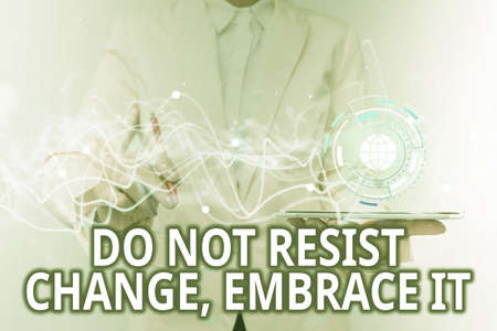 Inspiration showing sign Do Not Resist Change Embrace It. Internet Concept Be open to changes try new things Positive Lady In Uniform Using Futuristic Mobile Holographic Display Screen.の写真素材
