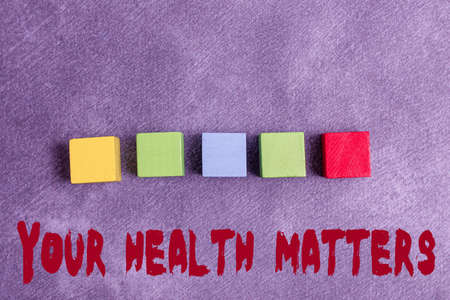 Handwriting text Your Health Matters. Internet Concept good health is most important among other things Stack of Sample Cube Rectangular Boxes On Surface Polished With Multi-Colourの写真素材