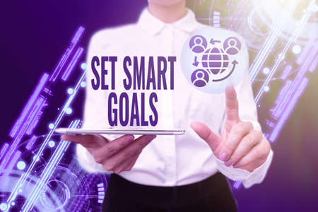 Sign displaying Set Smart Goals. Business concept giving criteria to guide in the setting of...