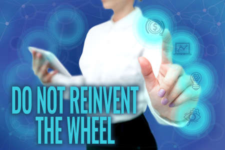 Handwriting text Do Not Reinvent The Wheel. Business idea stop duplicating a basic method previously done Lady In Uniform Standing Hold Phone Virtual Press Button Futuristic Tech.の写真素材